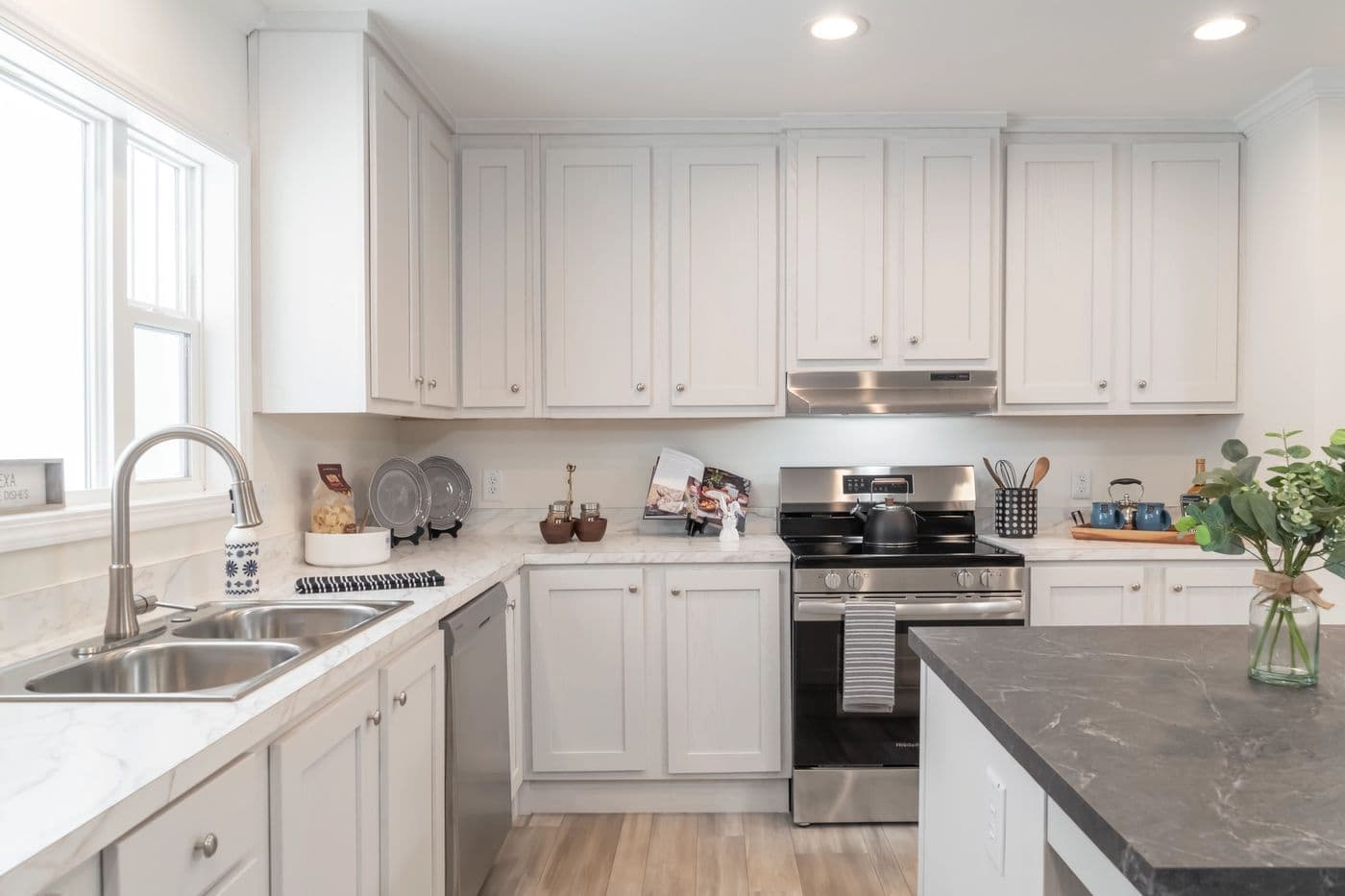 The 4230 "CLEARWATER" 7632 Kitchen. This Manufactured Mobile Home features 4 bedrooms and 2 baths.