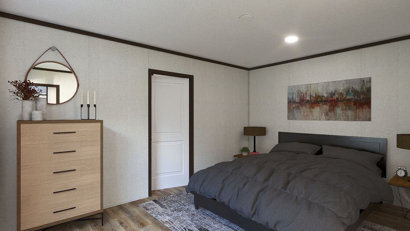 The SPIRIT Primary Bedroom. This Manufactured Mobile Home features 2 bedrooms and 2 baths.