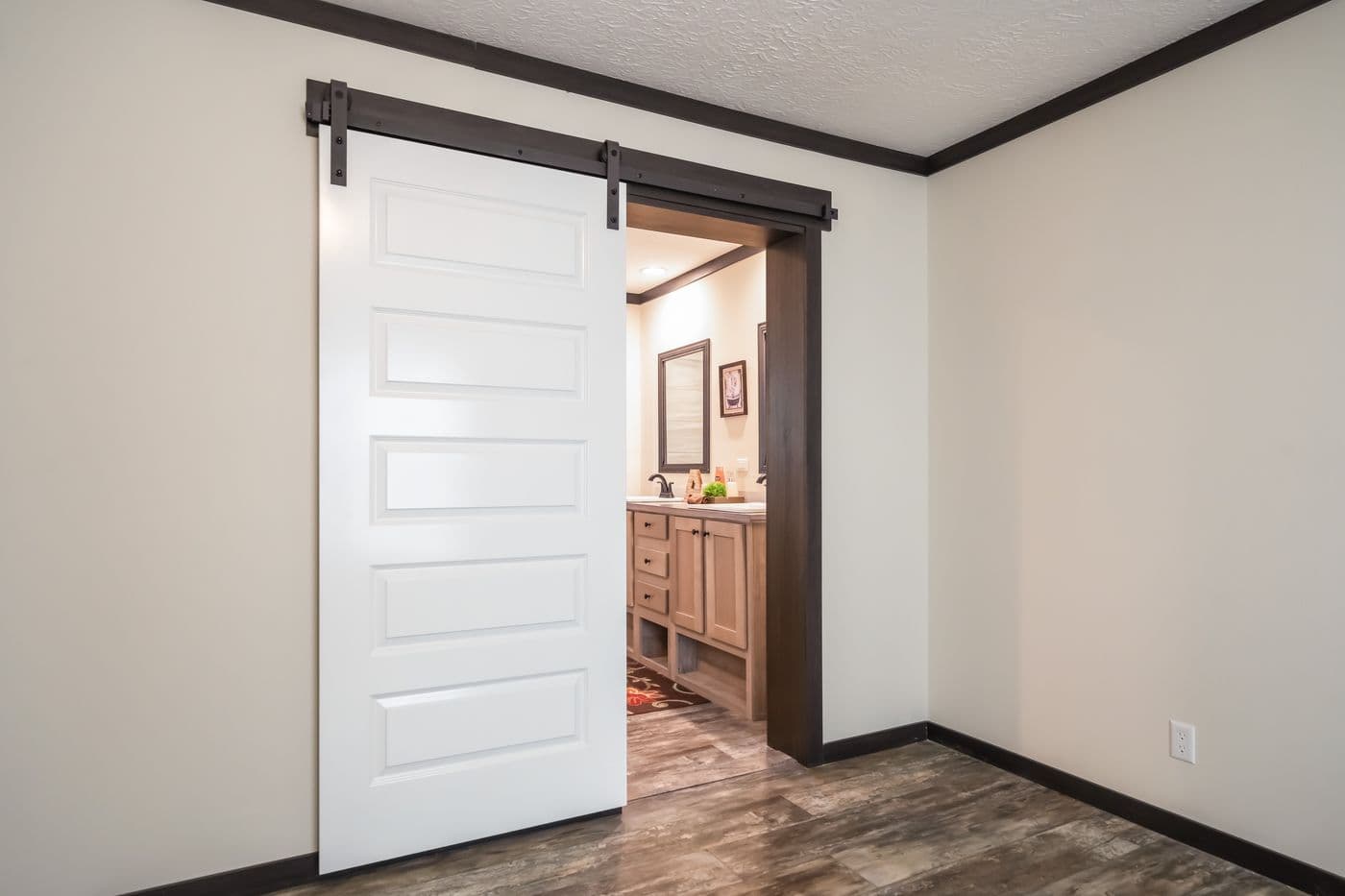 The BOUJEE 2 Primary Bathroom. This Manufactured Mobile Home features 3 bedrooms and 2 baths.