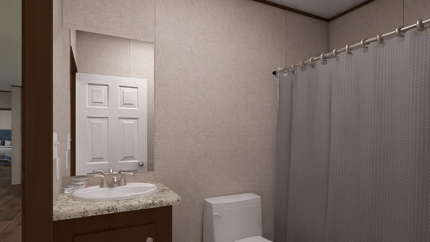 The SPRUCE Guest Bathroom. This Manufactured Mobile Home features 3 bedrooms and 2 baths.