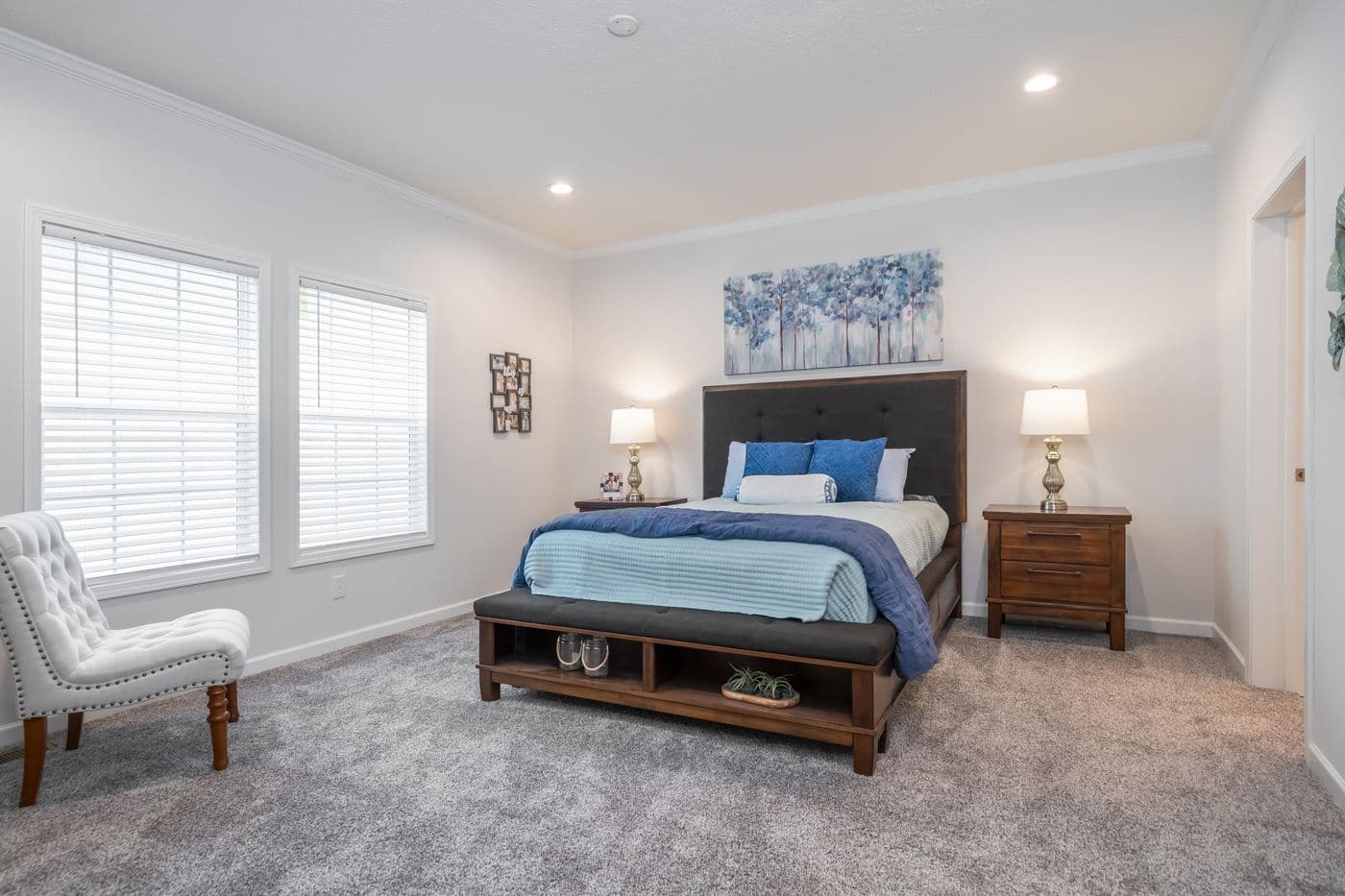 The 1444 CAROLINA Primary Bedroom. This Manufactured Mobile Home features 4 bedrooms and 2 baths.