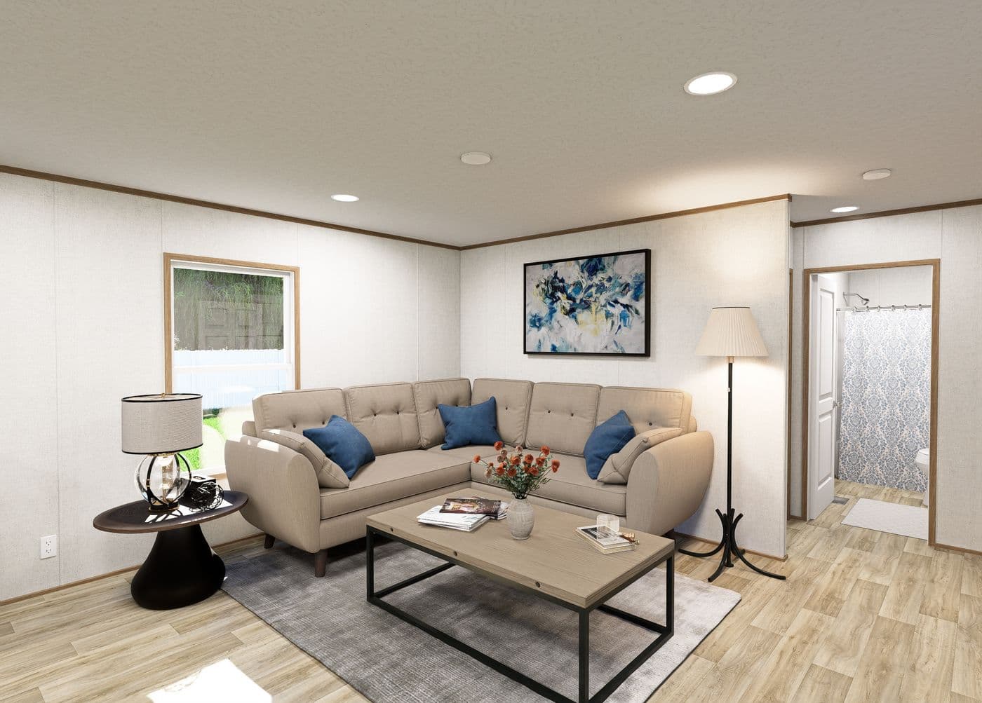 The EMBER Living Room. This Manufactured Mobile Home features 2 bedrooms and 2 baths.