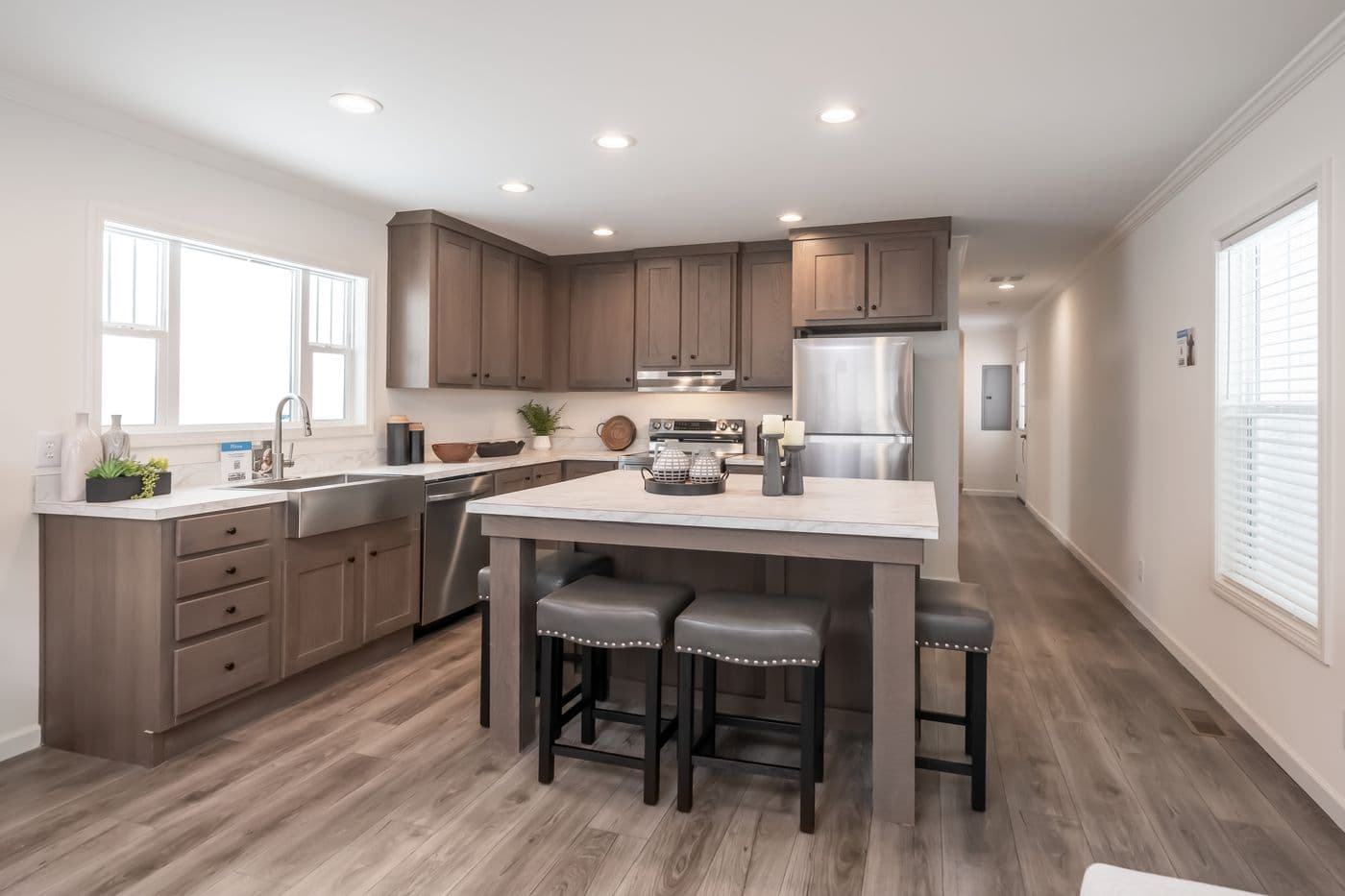 The 4200 "SOUTHPORT" 58'4X16 Kitchen. This Manufactured Mobile Home features 2 bedrooms and 2 baths.