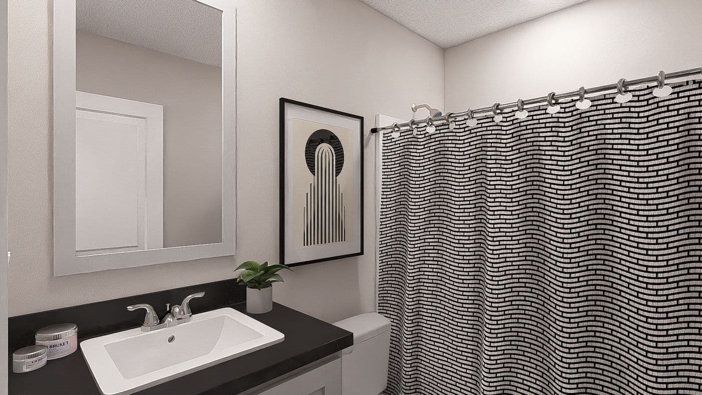 The HERE COMES THE SUN Guest Bathroom. This Manufactured Mobile Home features 3 bedrooms and 2 baths.