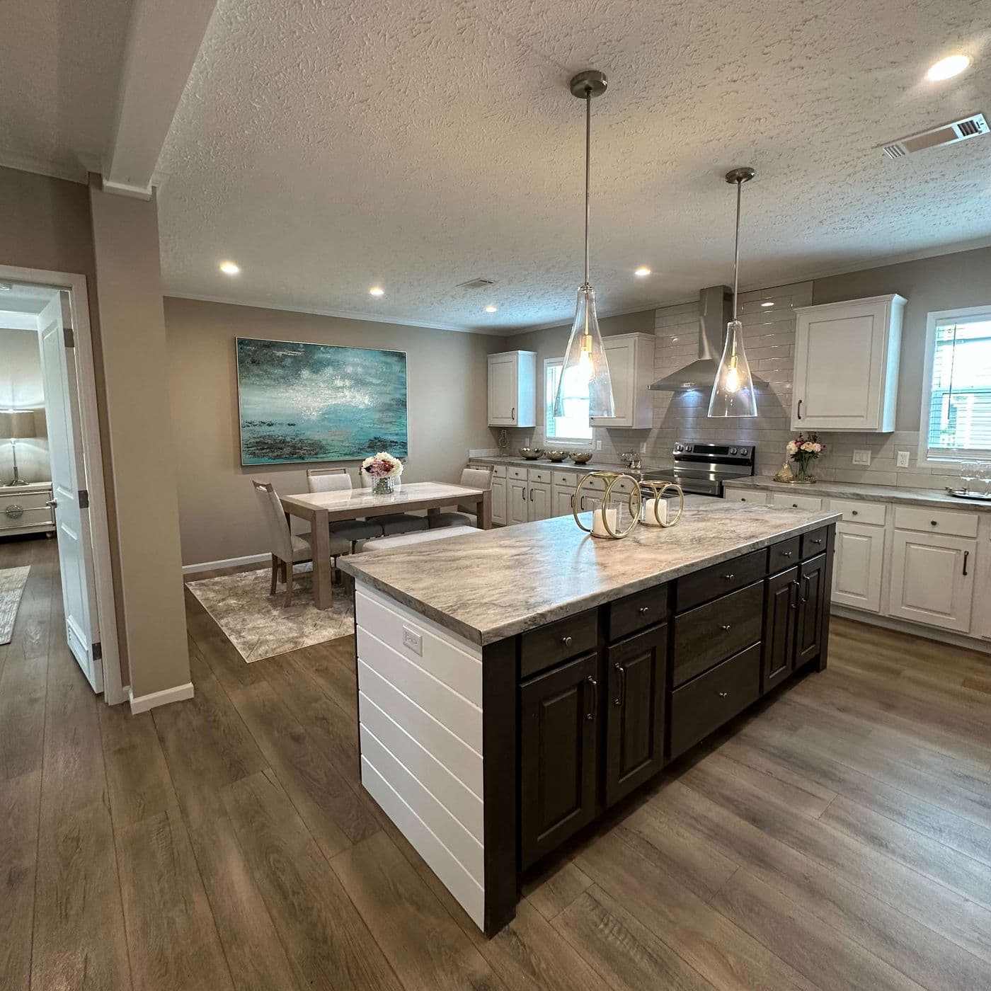 The THE HEXAGON Kitchen. This Manufactured Mobile Home features 4 bedrooms and 3 baths.
