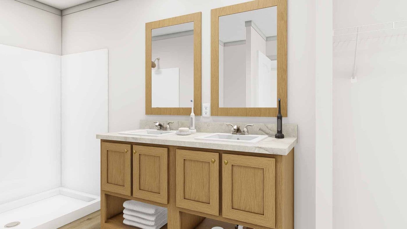 The SOLSBURY HILL Primary Bathroom. This Manufactured Mobile Home features 3 bedrooms and 2 baths.