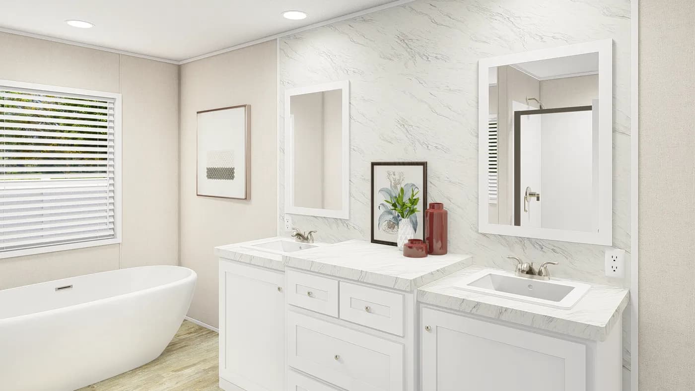 The GRAND LIVING 76 Primary Bathroom. This Manufactured Mobile Home features 4 bedrooms and 2 baths.