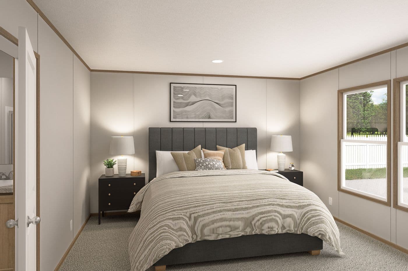 The THE EAGLE 60 Primary Bedroom. This Manufactured Mobile Home features 3 bedrooms and 2 baths.