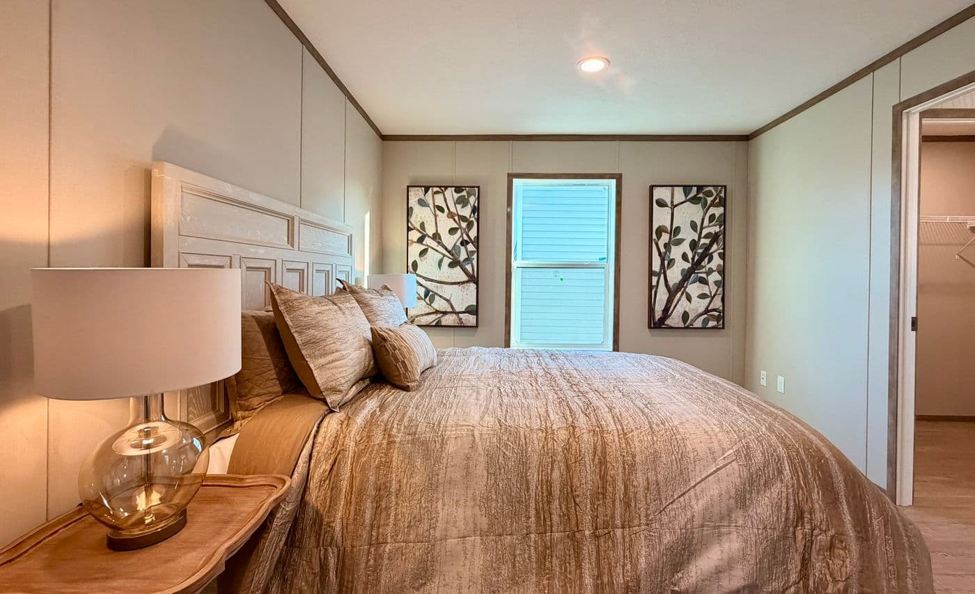 The BERYL Primary Bedroom. This Manufactured Mobile Home features 3 bedrooms and 2 baths.