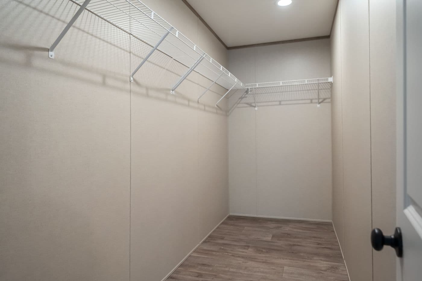The PT 78 Primary Bedroom. This Manufactured Mobile Home features 3 bedrooms and 2 baths.