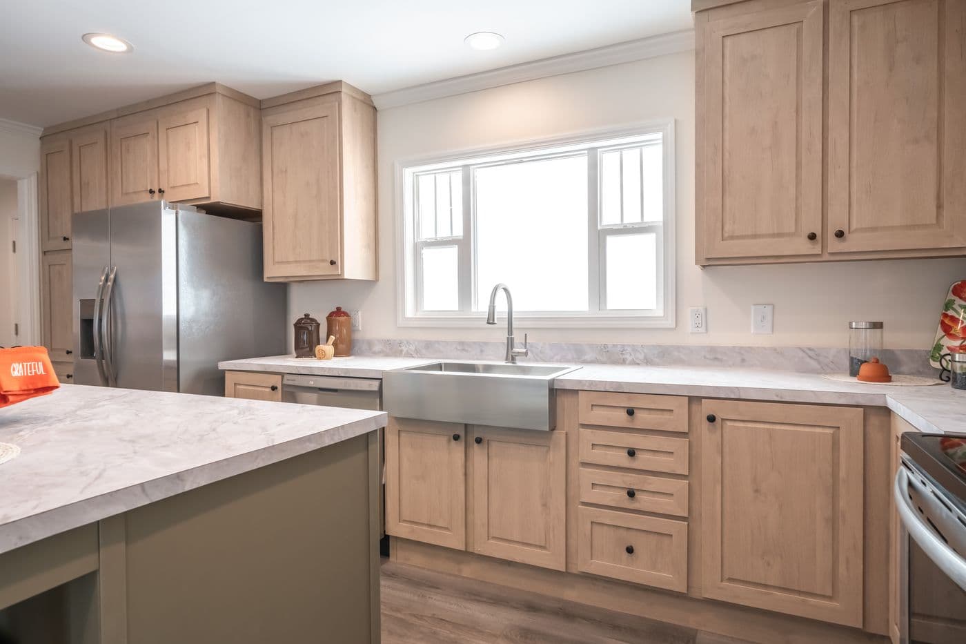 The 4220 "ATLANTIC" 7228 Kitchen. This Manufactured Mobile Home features 3 bedrooms and 2 baths.