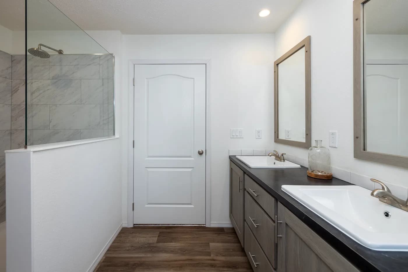 The ROOSEVELT Primary Bathroom. This Manufactured Mobile Home features 3 bedrooms and 2 baths.