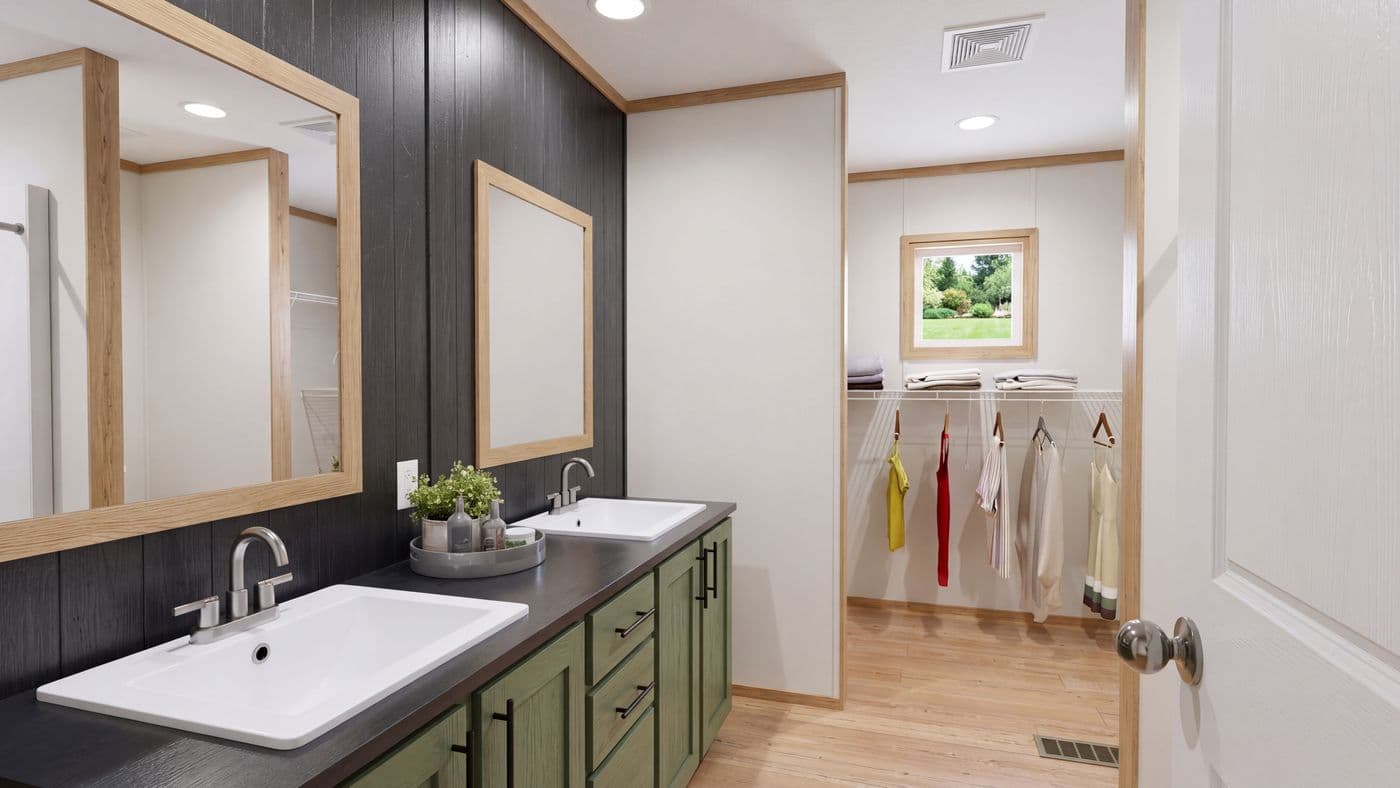 The BOONE Primary Bathroom. This Manufactured Mobile Home features 4 bedrooms and 2 baths.