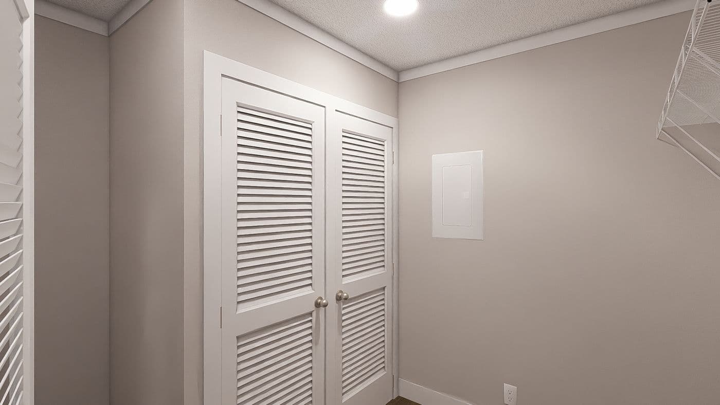The LET IT BE Utility Room. This Manufactured Mobile Home features 3 bedrooms and 2 baths.