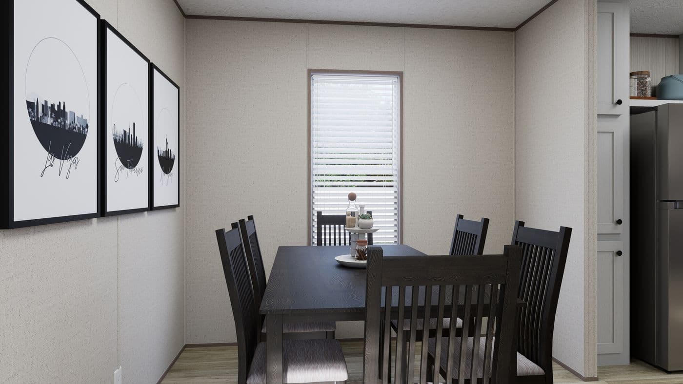 The ROCKY VALLEY Dining Area. This Manufactured Mobile Home features 3 bedrooms and 2 baths.
