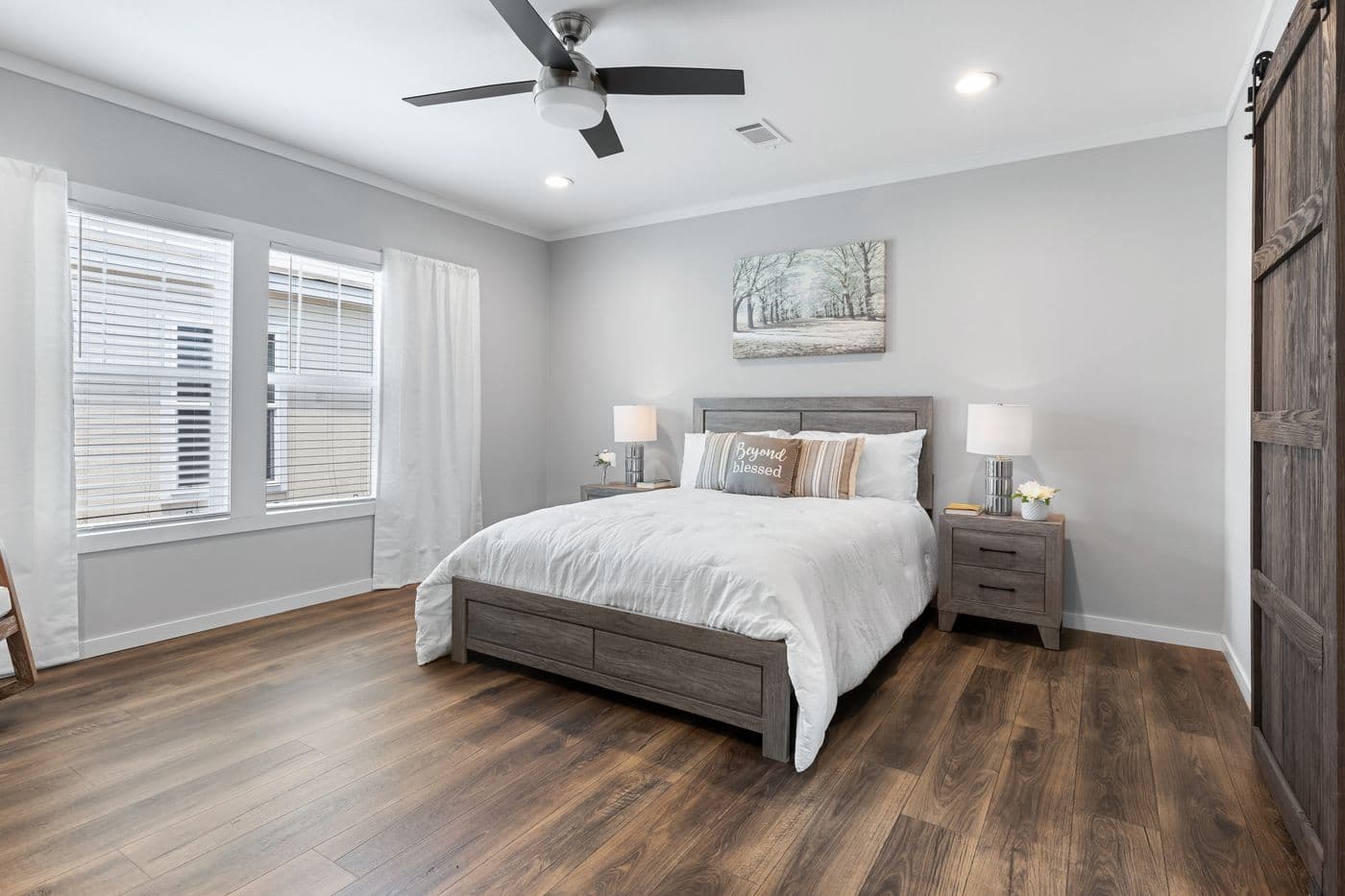 The THE MONTERREY Primary Bedroom. This Manufactured Mobile Home features 4 bedrooms and 3 baths.