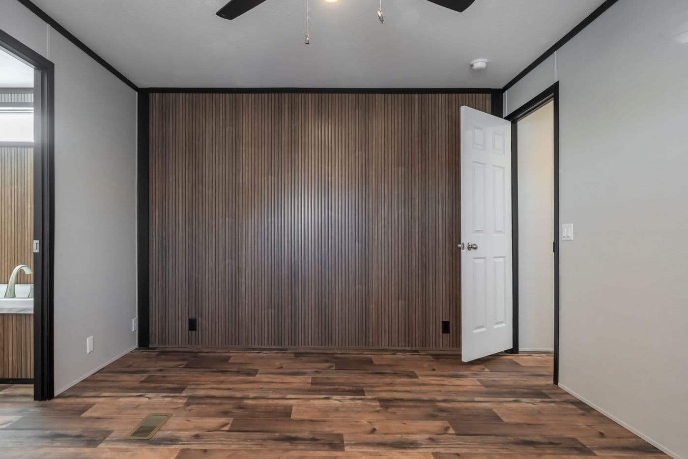 The RAVENWOOD Bedroom. This Manufactured Mobile Home features 3 bedrooms and 2 baths.