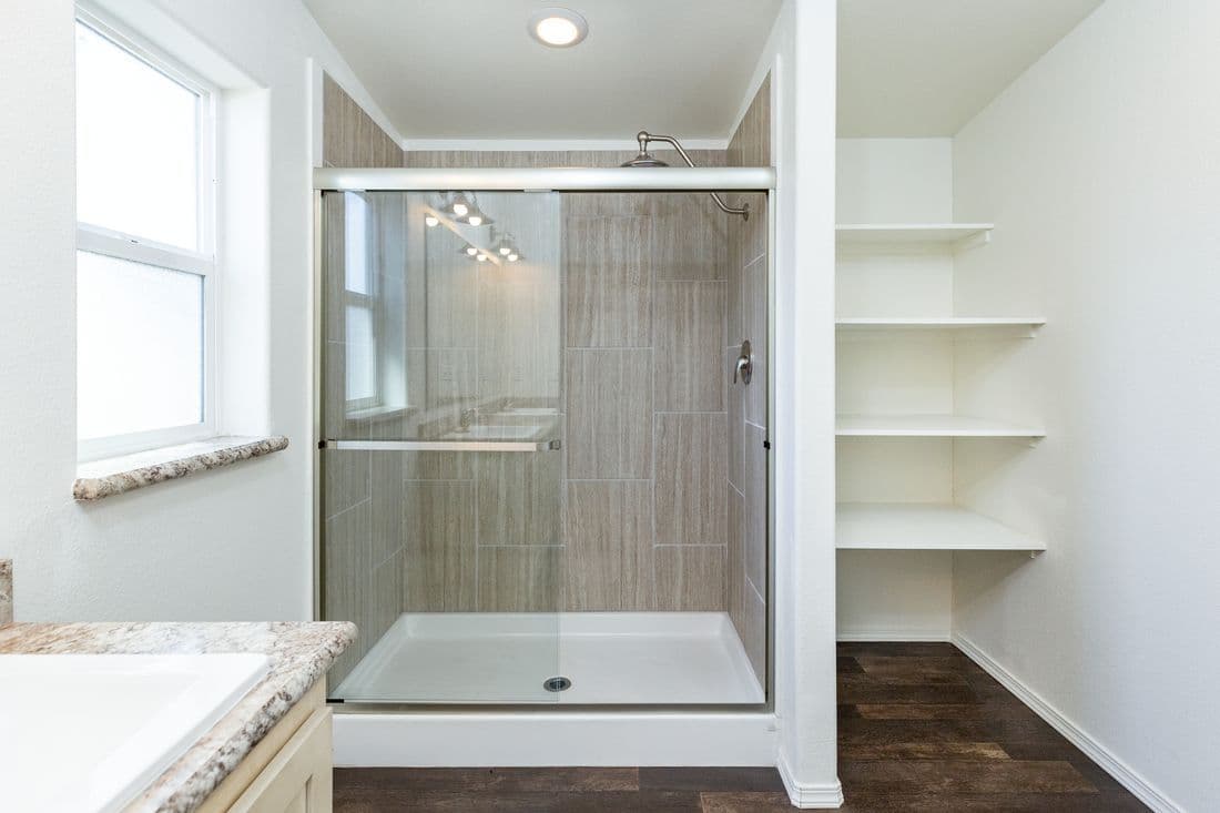The 2017 COLUMBIA RIVER (NEW) Primary Bathroom. This Manufactured Mobile Home features 3 bedrooms and 2 baths.