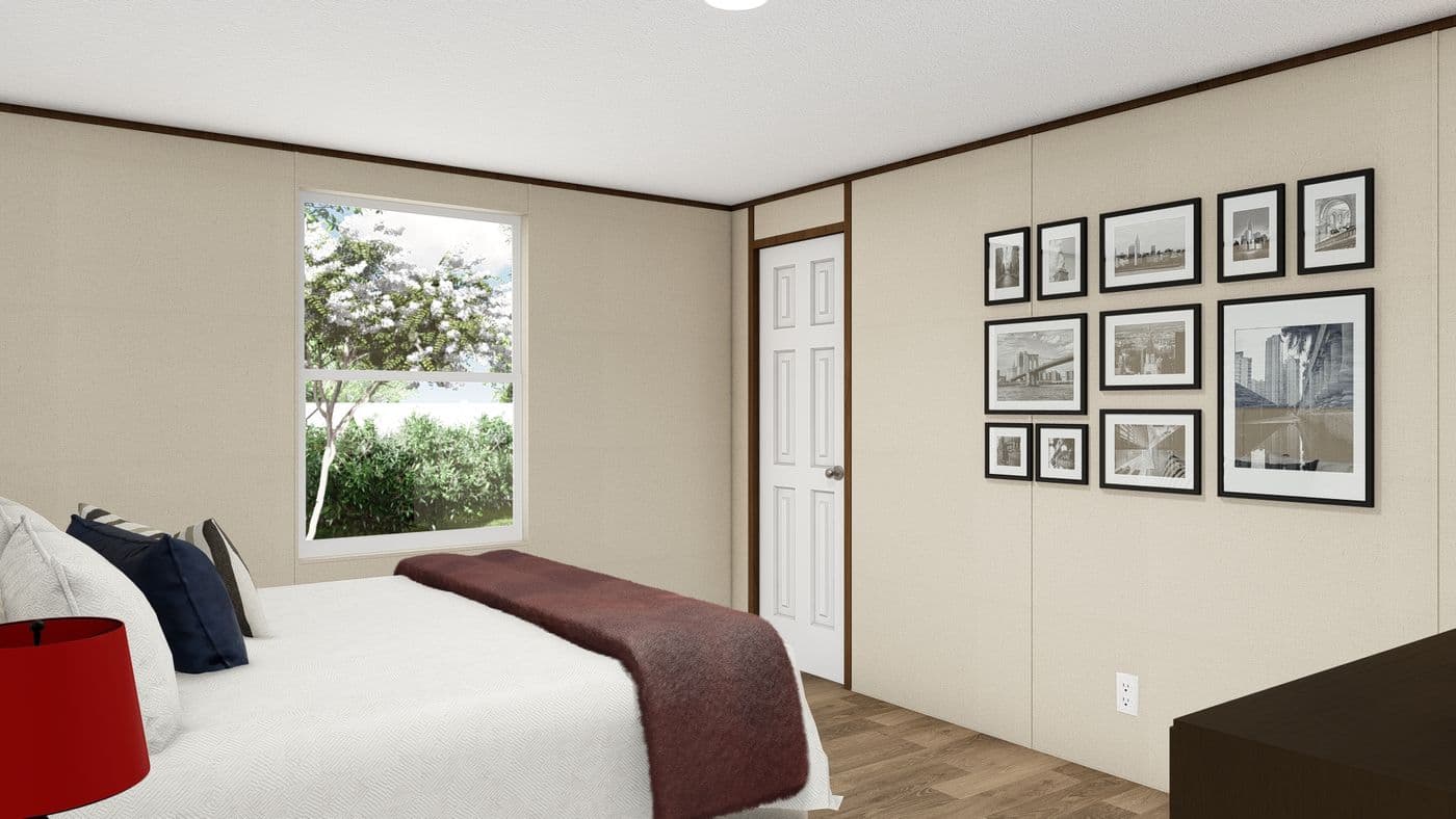 The PRIDE Bedroom. This Manufactured Mobile Home features 4 bedrooms and 2 baths.