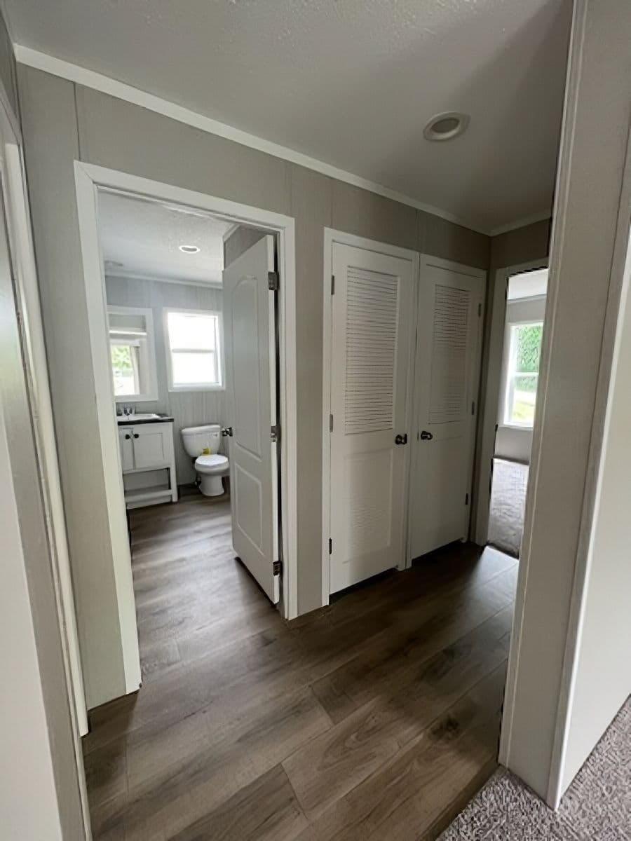 The JADE 40 Guest Bedroom. This Manufactured Mobile Home features 2 bedrooms and 2 baths.
