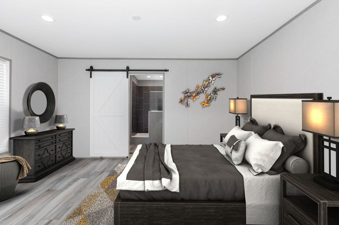 The THE ULTIMATE SHOWER Primary Bedroom. This Manufactured Mobile Home features 3 bedrooms and 2 baths.