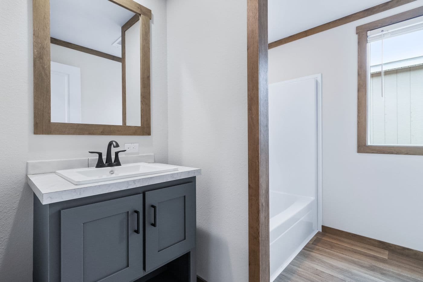The FARM 3 FLEX Guest Bathroom. This Manufactured Mobile Home features 3 bedrooms and 2 baths.