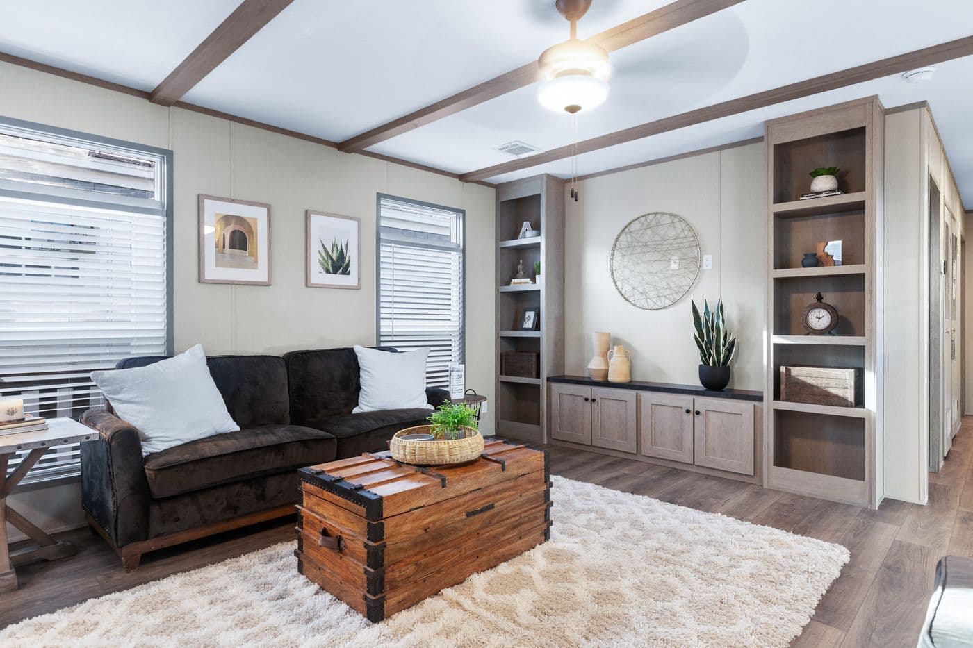 The ANNIVERSARY 16763A Living Room. This Manufactured Mobile Home features 3 bedrooms and 2 baths.