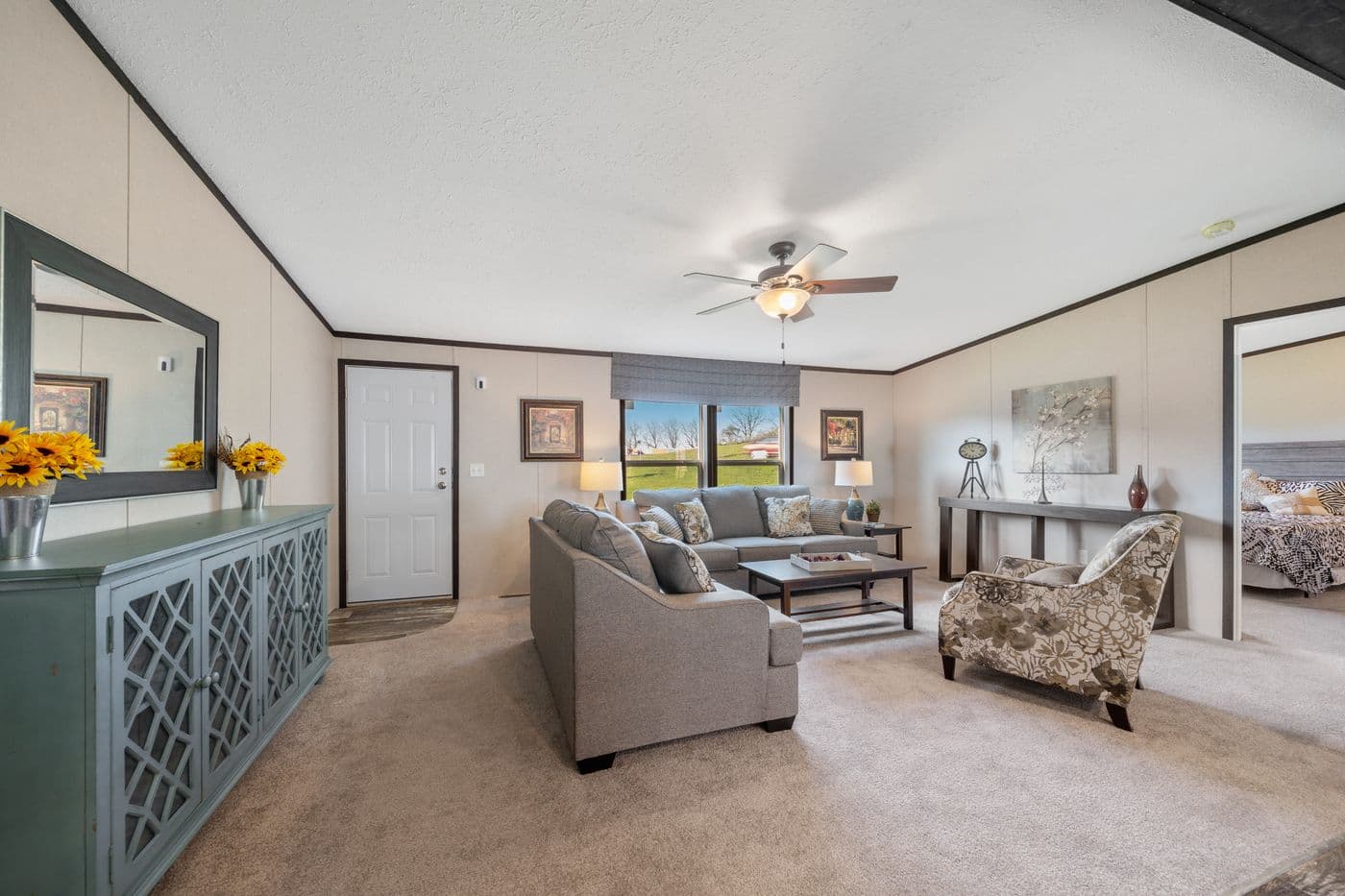 The GARNET Living Room. This Manufactured Mobile Home features 3 bedrooms and 2 baths.