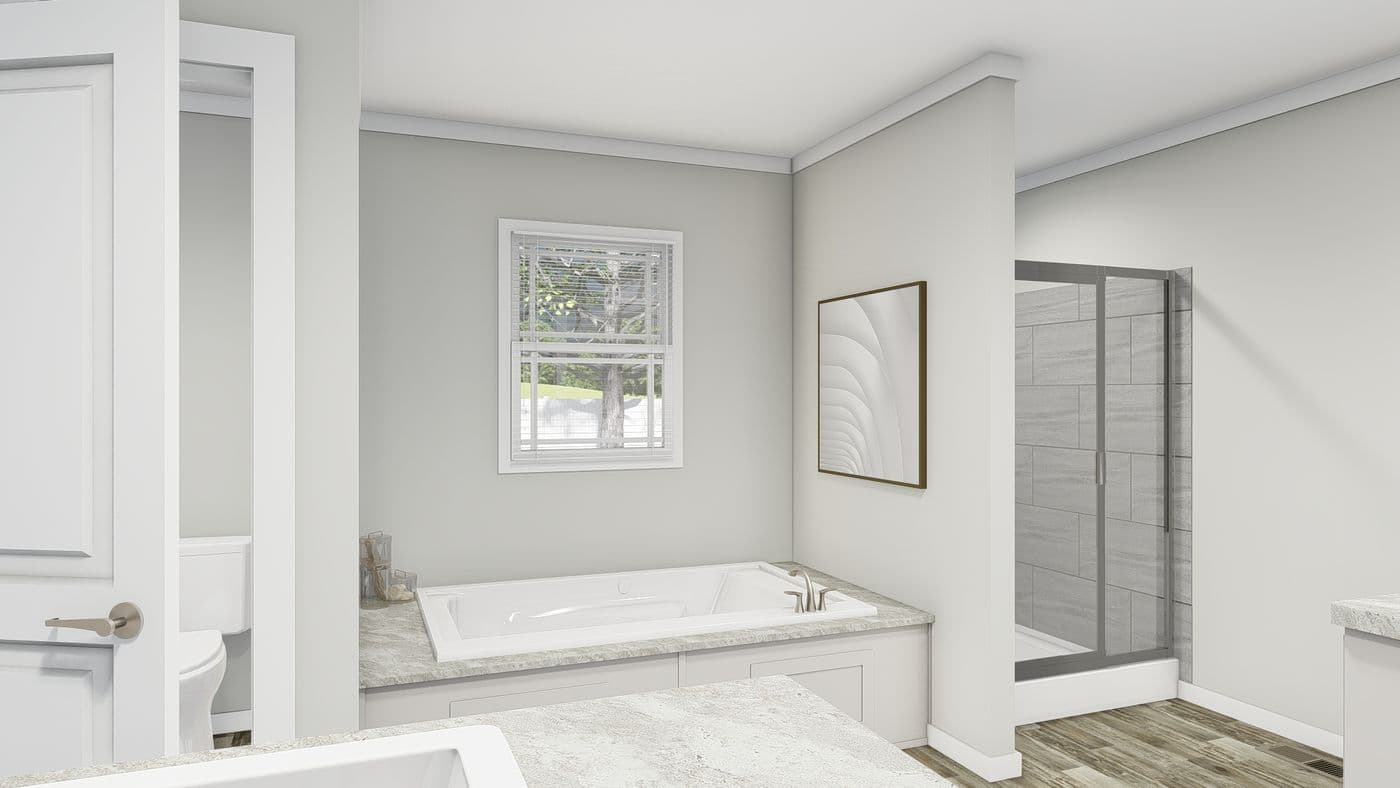 The FRONTIER Primary Bathroom. This Manufactured Mobile Home features 3 bedrooms and 2 baths.