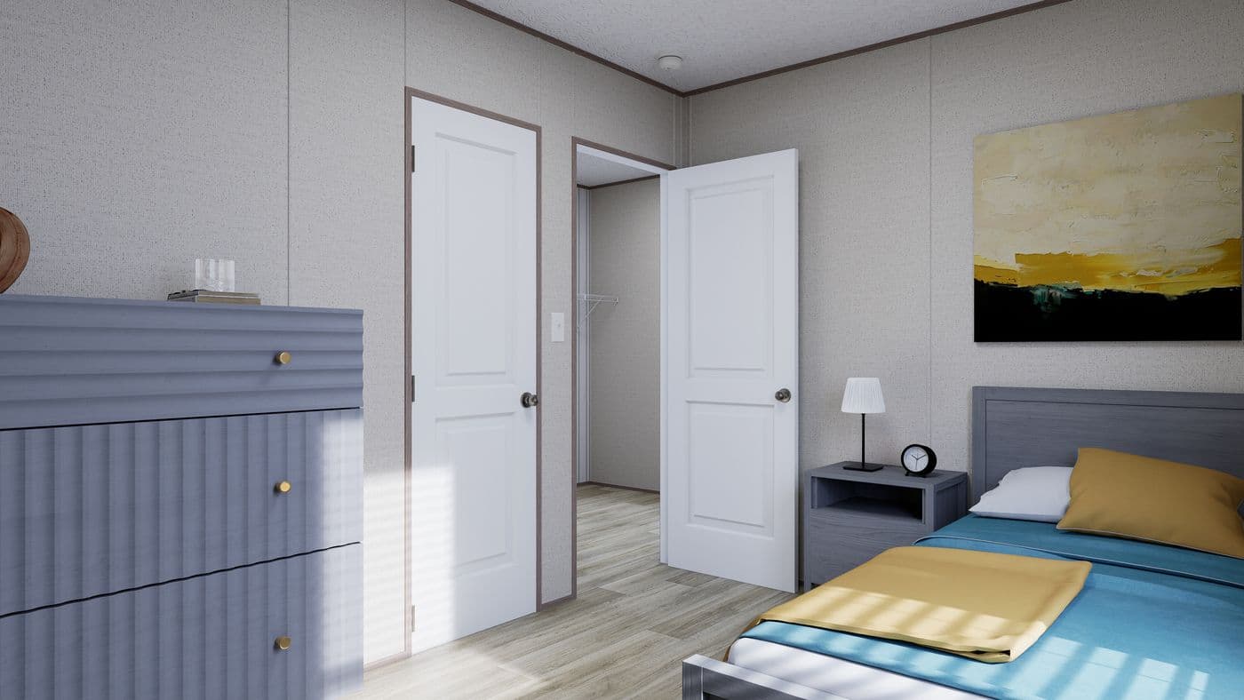 The FOOTHILLS 56 Guest Bedroom. This Manufactured Mobile Home features 2 bedrooms and 2 baths.