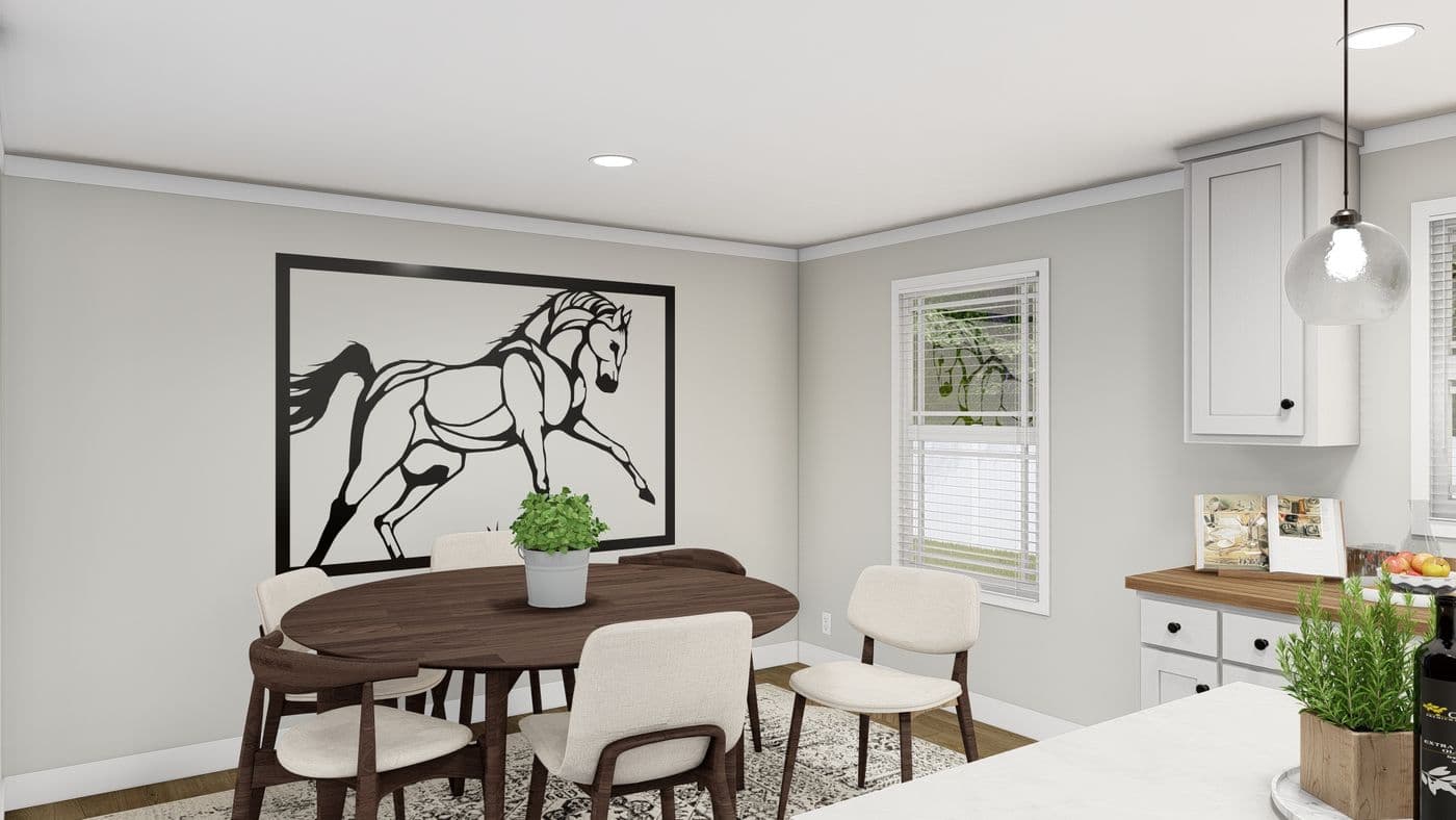The CHEYENNE Dining Room. This Manufactured Mobile Home features 3 bedrooms and 2 baths.