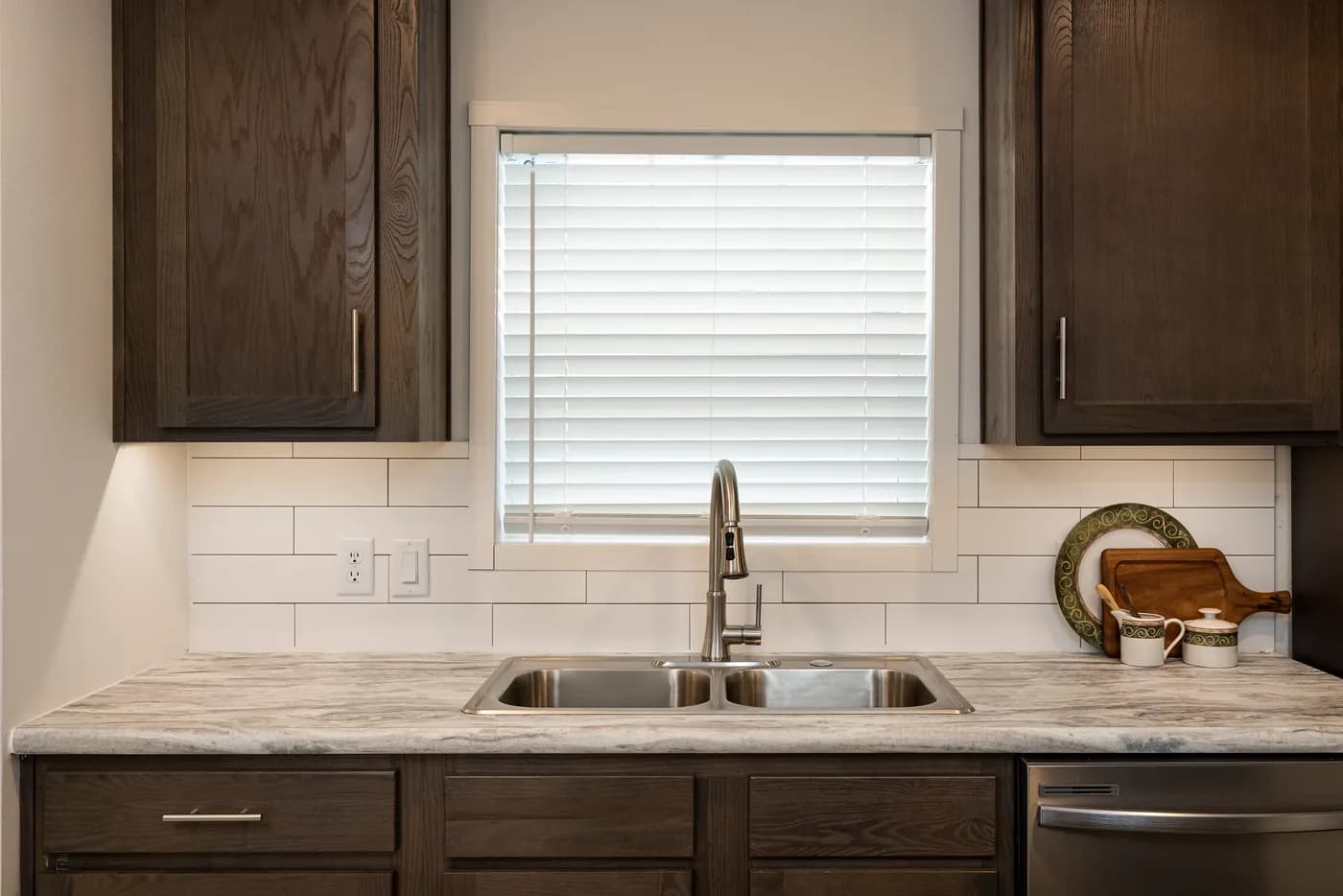 The RAMSEY 217-1 Kitchen. This Manufactured Mobile Home features 3 bedrooms and 2 baths.
