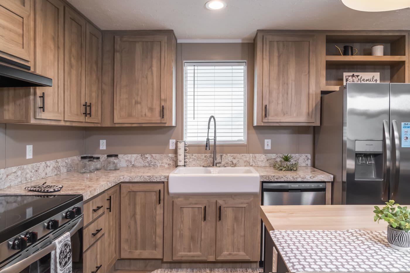 The TRADITION 56D Kitchen. This Manufactured Mobile Home features 3 bedrooms and 2 baths.