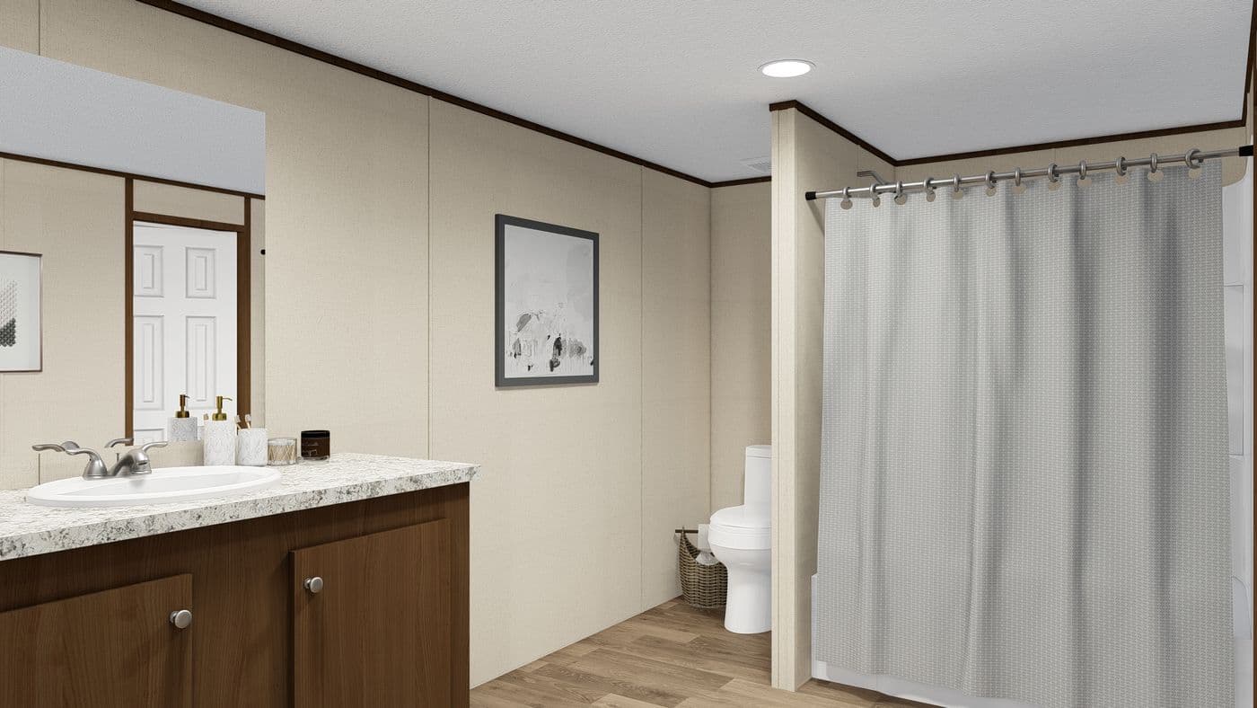 The PRIDE Primary Bathroom. This Manufactured Mobile Home features 4 bedrooms and 2 baths.