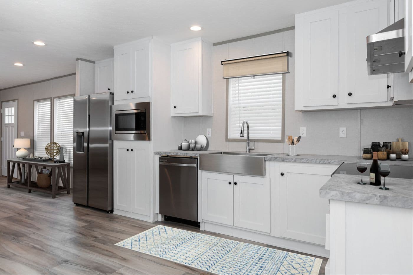 The THE ULTIMATE SHOWER Kitchen. This Manufactured Mobile Home features 3 bedrooms and 2 baths.