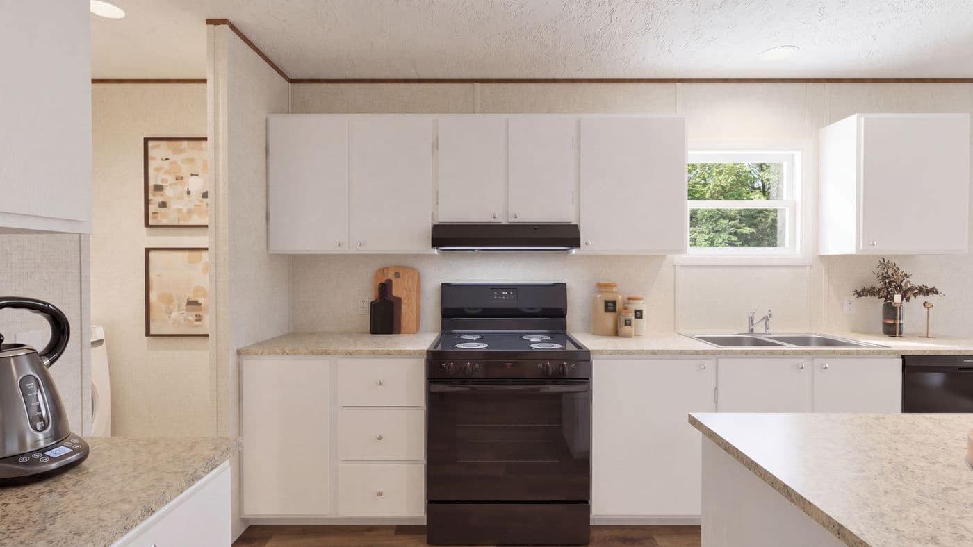 The SPRUCE Kitchen. This Manufactured Mobile Home features 3 bedrooms and 2 baths.