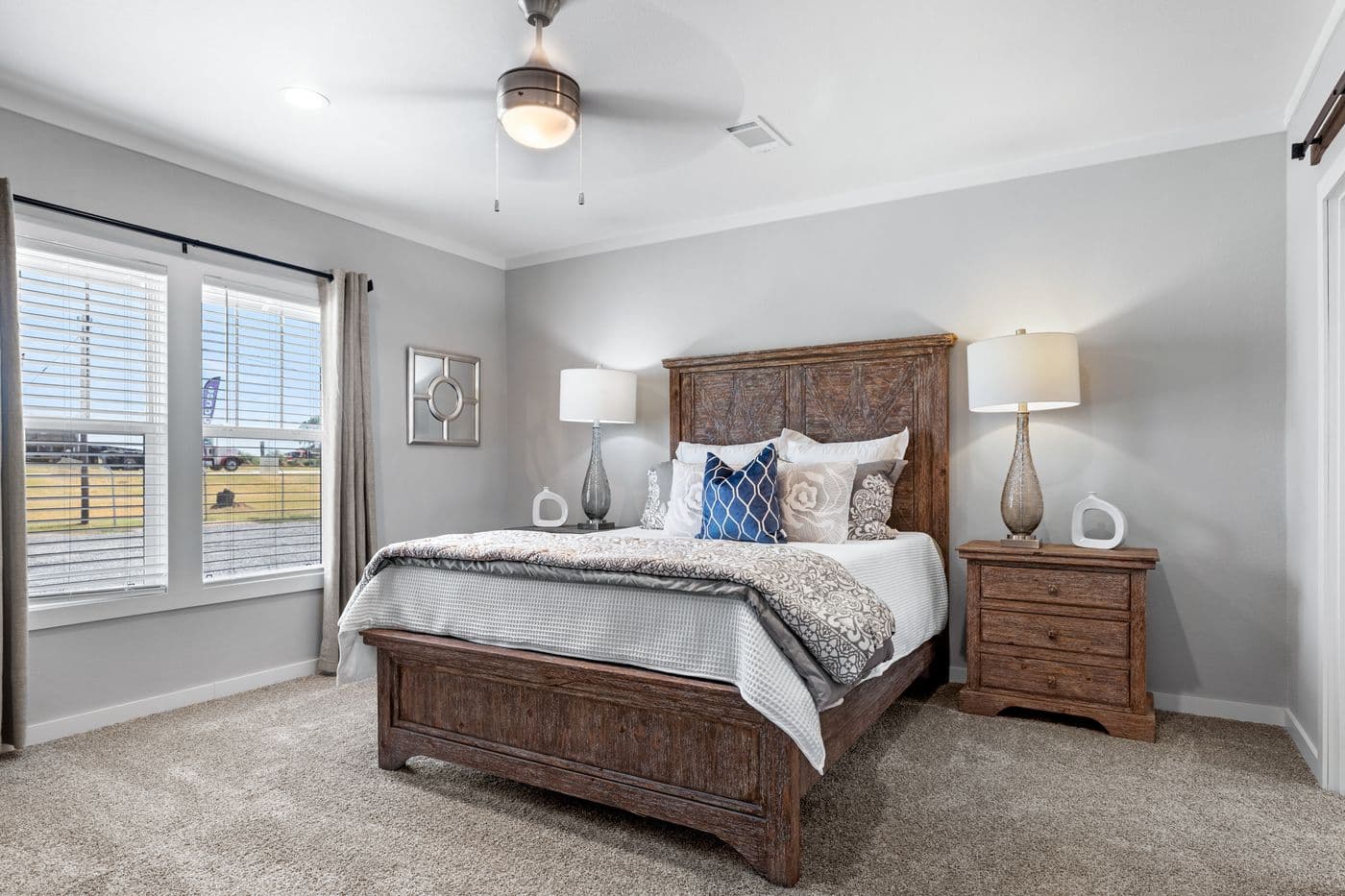 The EL CAPITAN Primary Bedroom. This Manufactured Mobile Home features 3 bedrooms and 2 baths.