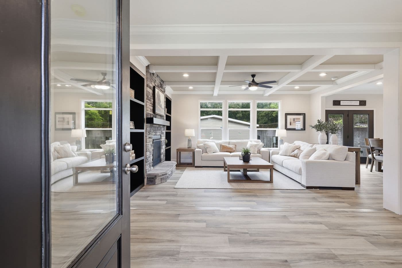 The THE SUMMIT Living Room. This Manufactured Mobile Home features 3 bedrooms and 2 baths.