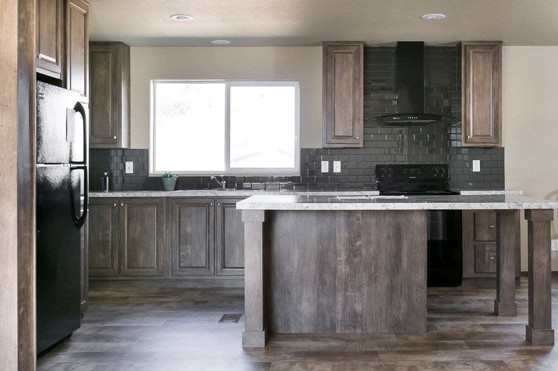 The 2022 COLUMBIA RIVER (NEW) Kitchen. This Manufactured Mobile Home features 3 bedrooms and 2 baths.