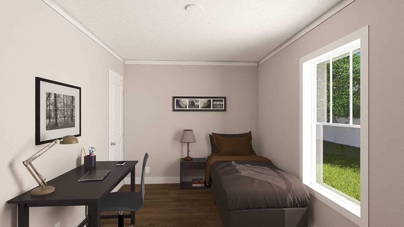 The SWEET CAROLINE Guest Bedroom. This Manufactured Mobile Home features 3 bedrooms and 2 baths.