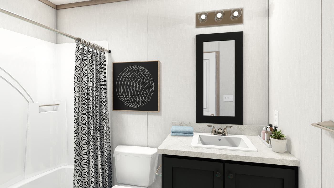The 7616-4773P THE PULSE Primary Bathroom. This Manufactured Mobile Home features 3 bedrooms and 2 baths.