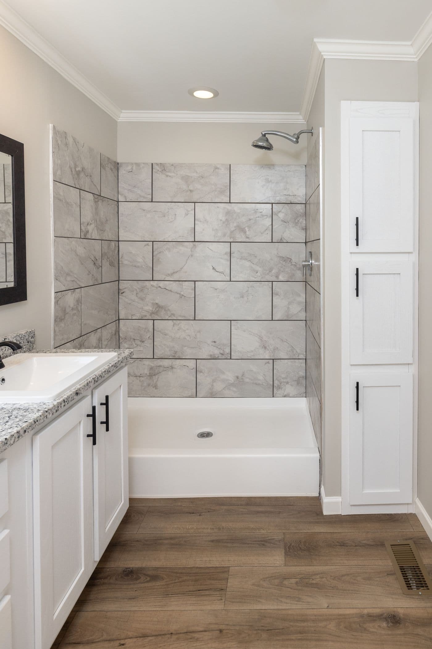 The HAWTHORNE Primary Bathroom. This Manufactured Mobile Home features 3 bedrooms and 2 baths.