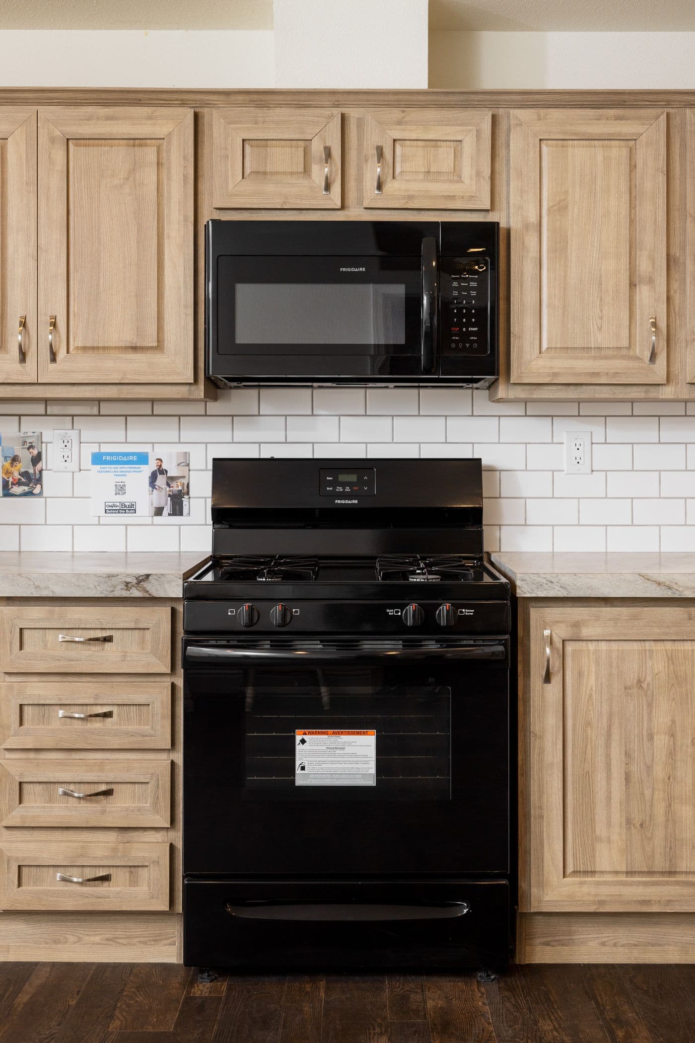 The FAIRPOINT 20382B Kitchen. This Manufactured Mobile Home features 2 bedrooms and 2 baths.