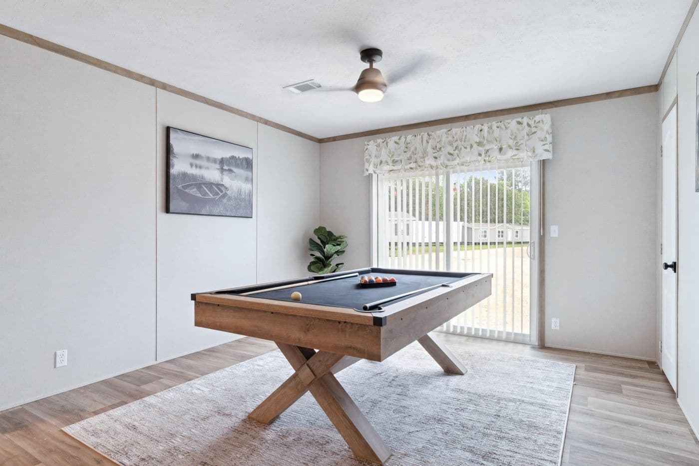 The BREEZE FARMHOUSE 72 Den. This Manufactured Mobile Home features 4 bedrooms and 2 baths.