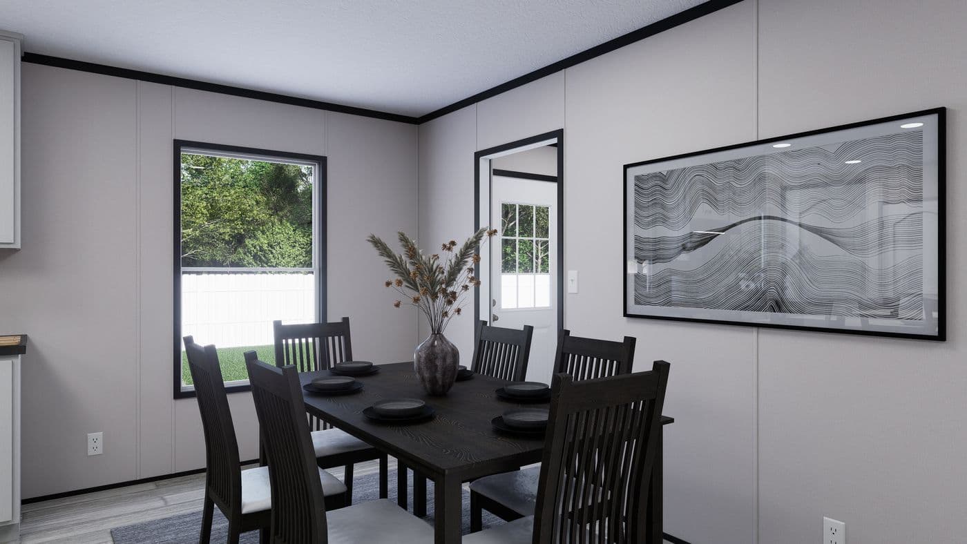 The THE MOUNTAINEER 56 Dining Area. This Manufactured Mobile Home features 3 bedrooms and 2 baths.