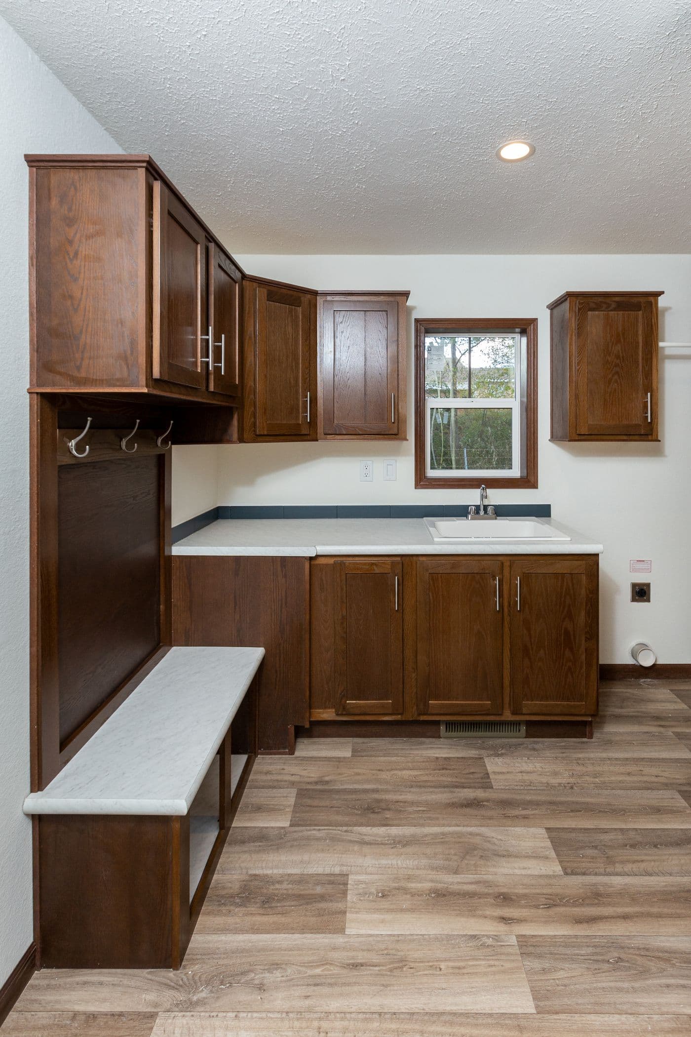 The LEGEND 86 Utility Room. This Manufactured Mobile Home features 3 bedrooms and 2 baths.