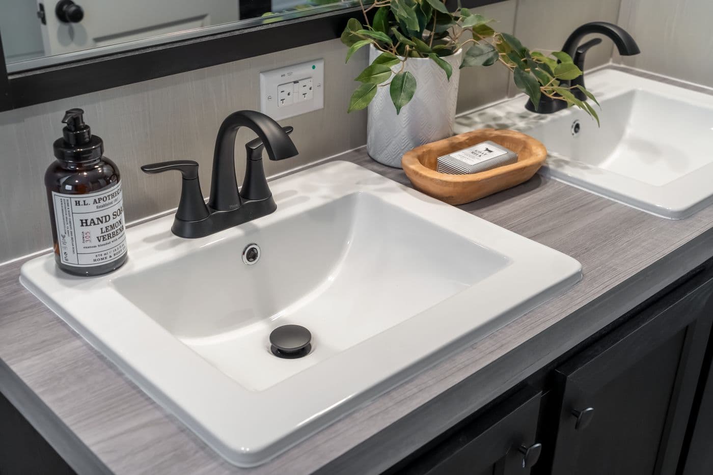 The CRAZY EIGHTS Primary Bathroom. This Manufactured Mobile Home features 4 bedrooms and 2 baths.