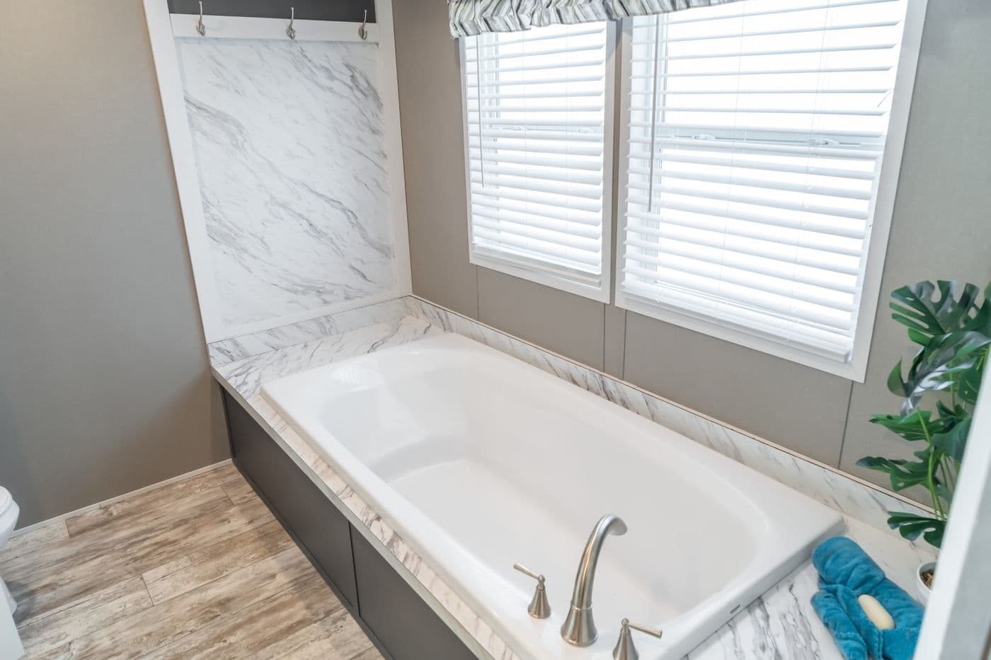 The MAJOR Primary Bathroom. This Manufactured Mobile Home features 3 bedrooms and 2 baths.