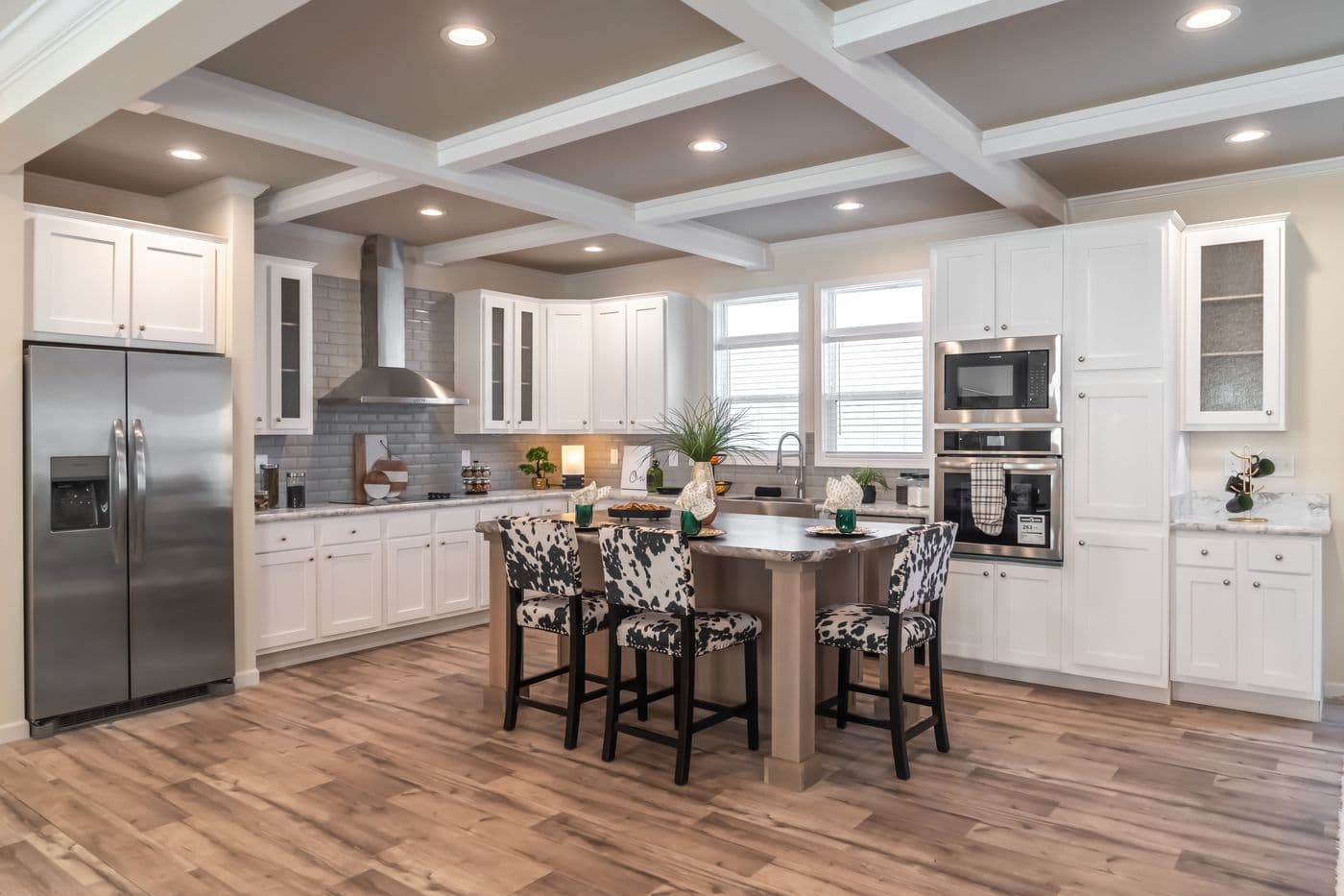 The SUPER 68 ELITE Kitchen. This Manufactured Mobile Home features 3 bedrooms and 2 baths.