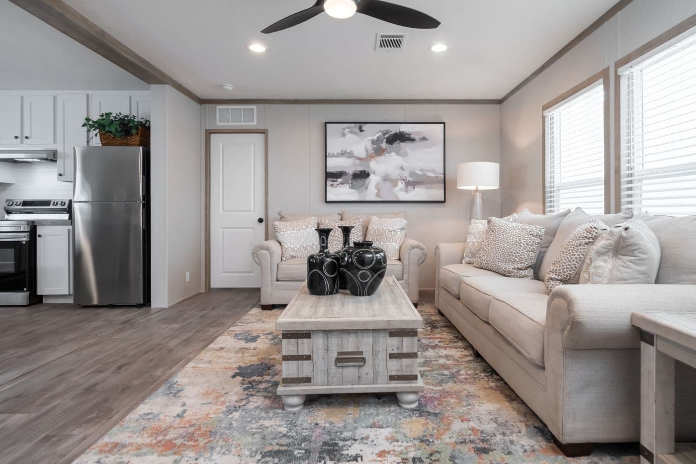 The PT 78 Living Room. This Manufactured Mobile Home features 3 bedrooms and 2 baths.